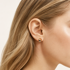Sterling Silver Polished Arch Stud Earrings worn on the ear