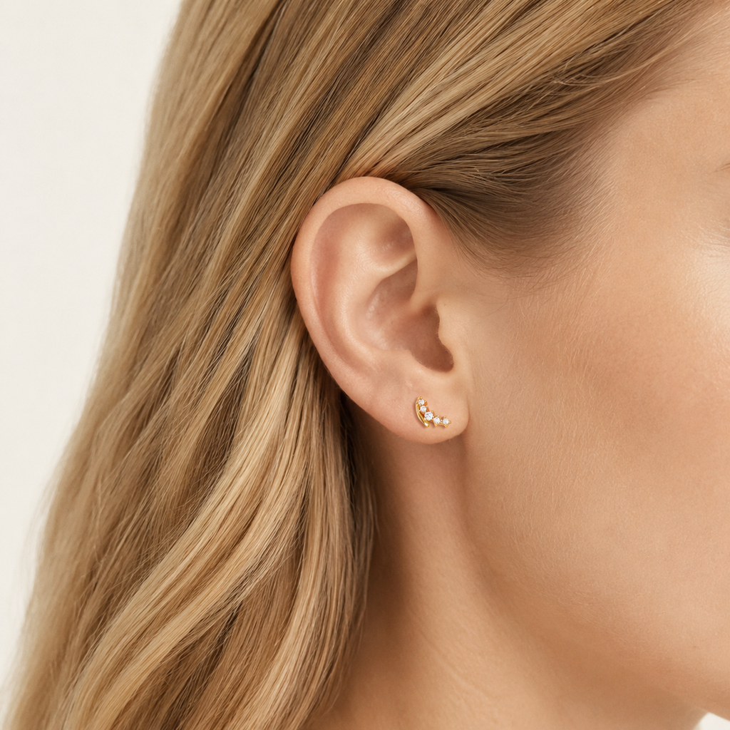 Sterling Silver Petite Cubic Zirconia Stud Earrings worn on the ear