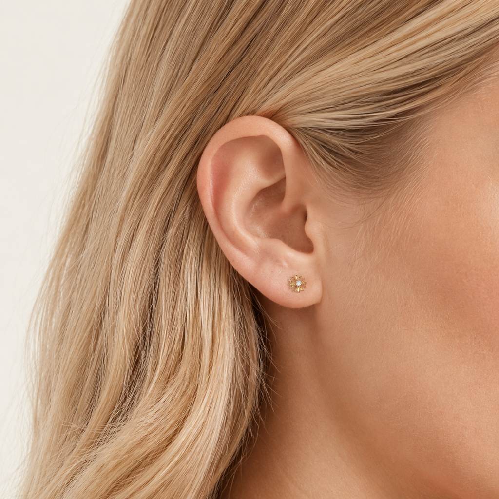 Sterling Silver Pinwheel Zirconia Flat Back Earrings worn on the ear