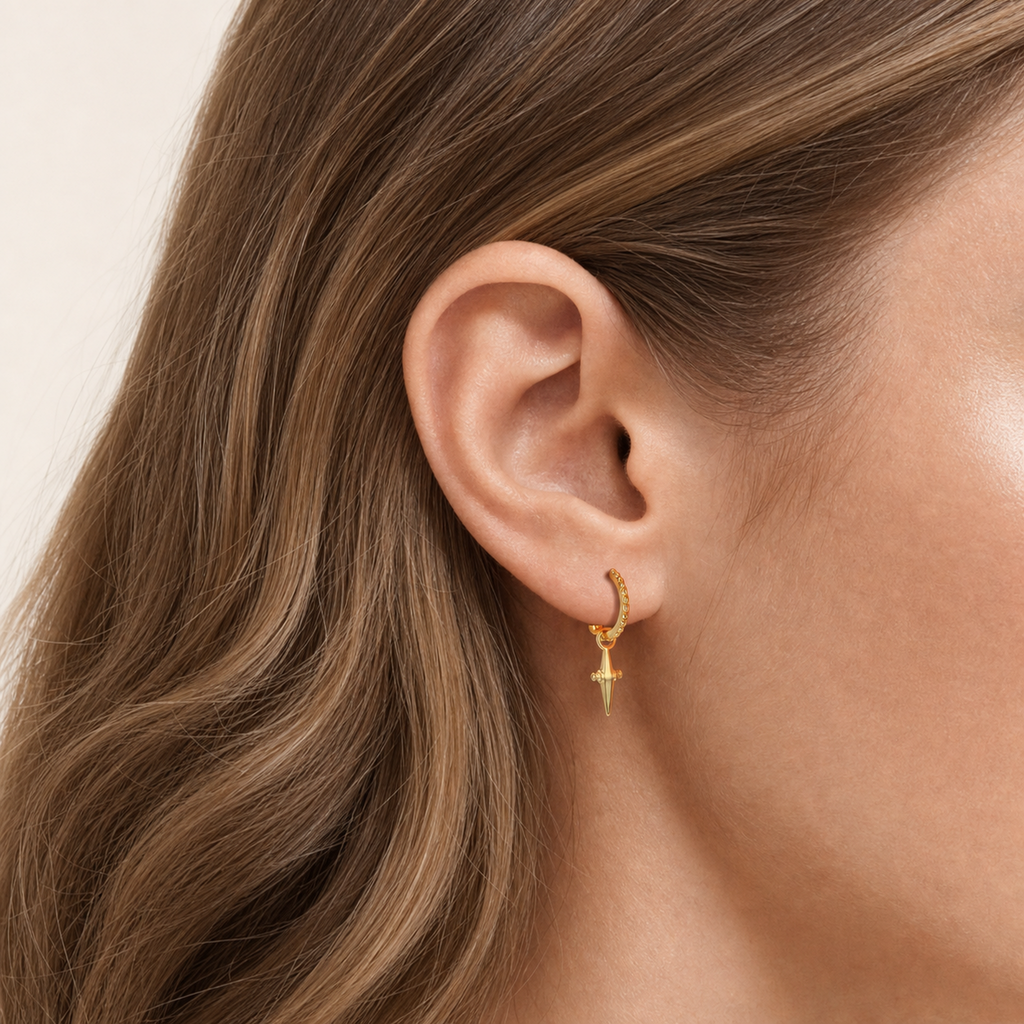 Sterling Silver Cross & Star Chain Drop Stud Earrings worn on the ear