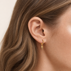 Sterling Silver Cross & Star Chain Drop Stud Earrings worn on the ear