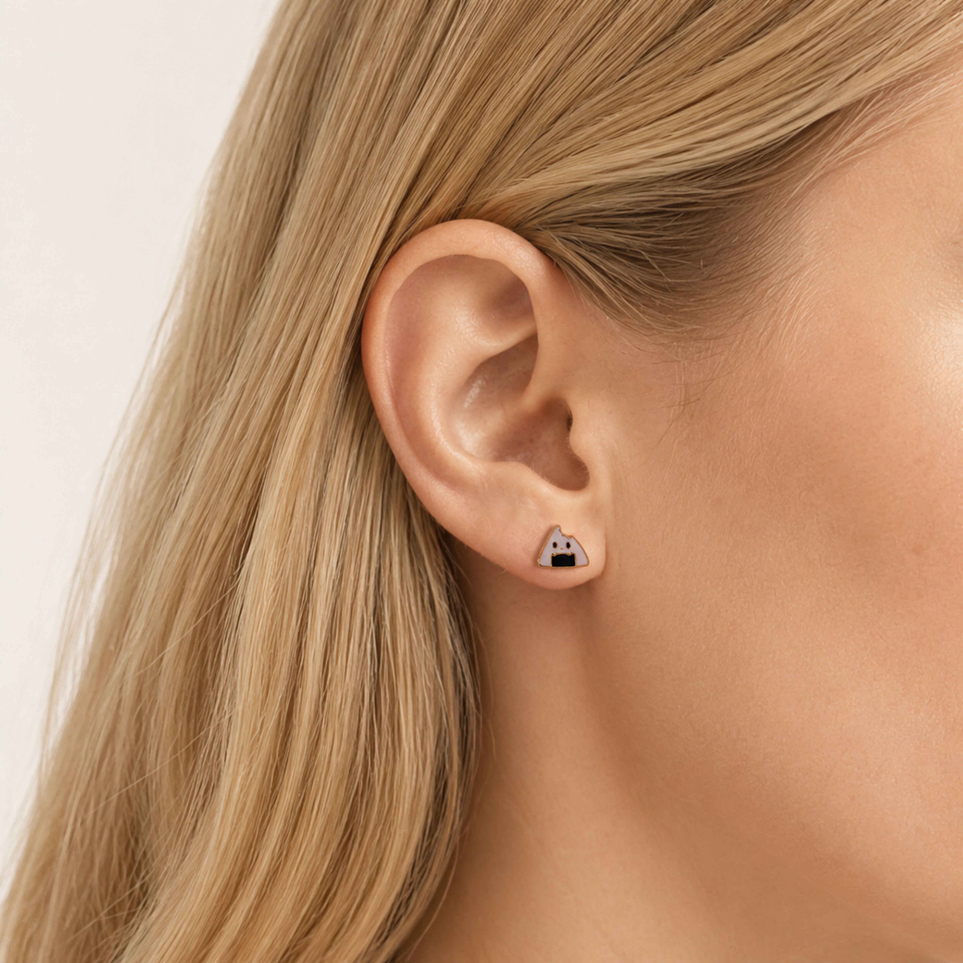 Sterling Silver Rice Ball Stud Earrings worn on the ear