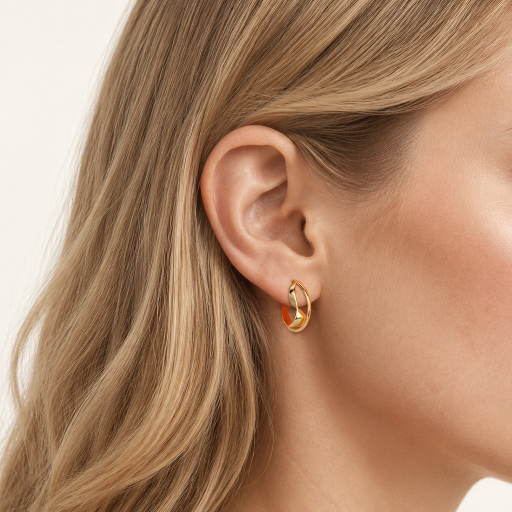 Sterling Silver Double C-Curve Stud Earrings worn on the ear