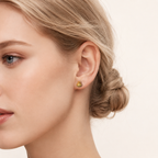 Sterling Silver Mini Shell Stud Earrings worn on the ear
