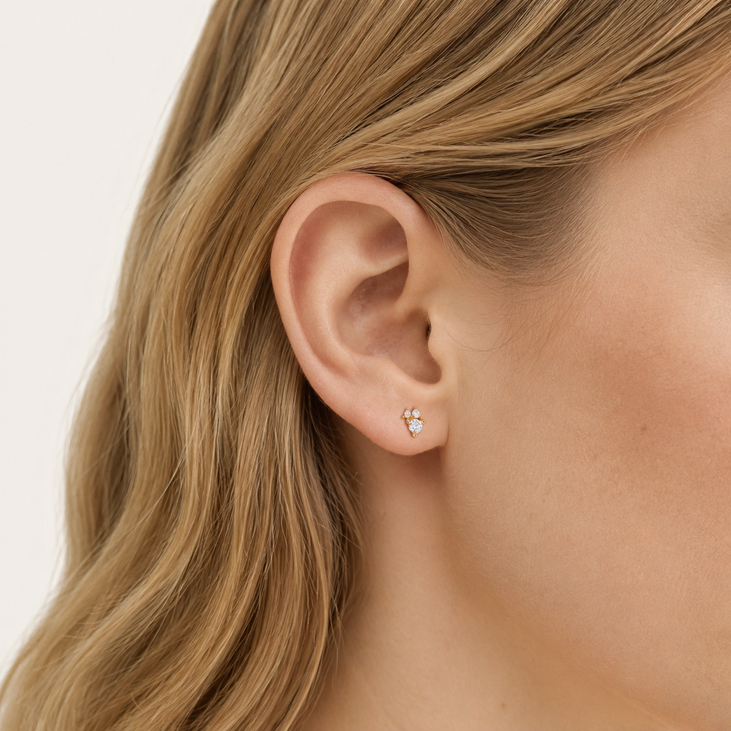 Sterling Silver Solitaire Zirconia Stud Earrings worn on the ear