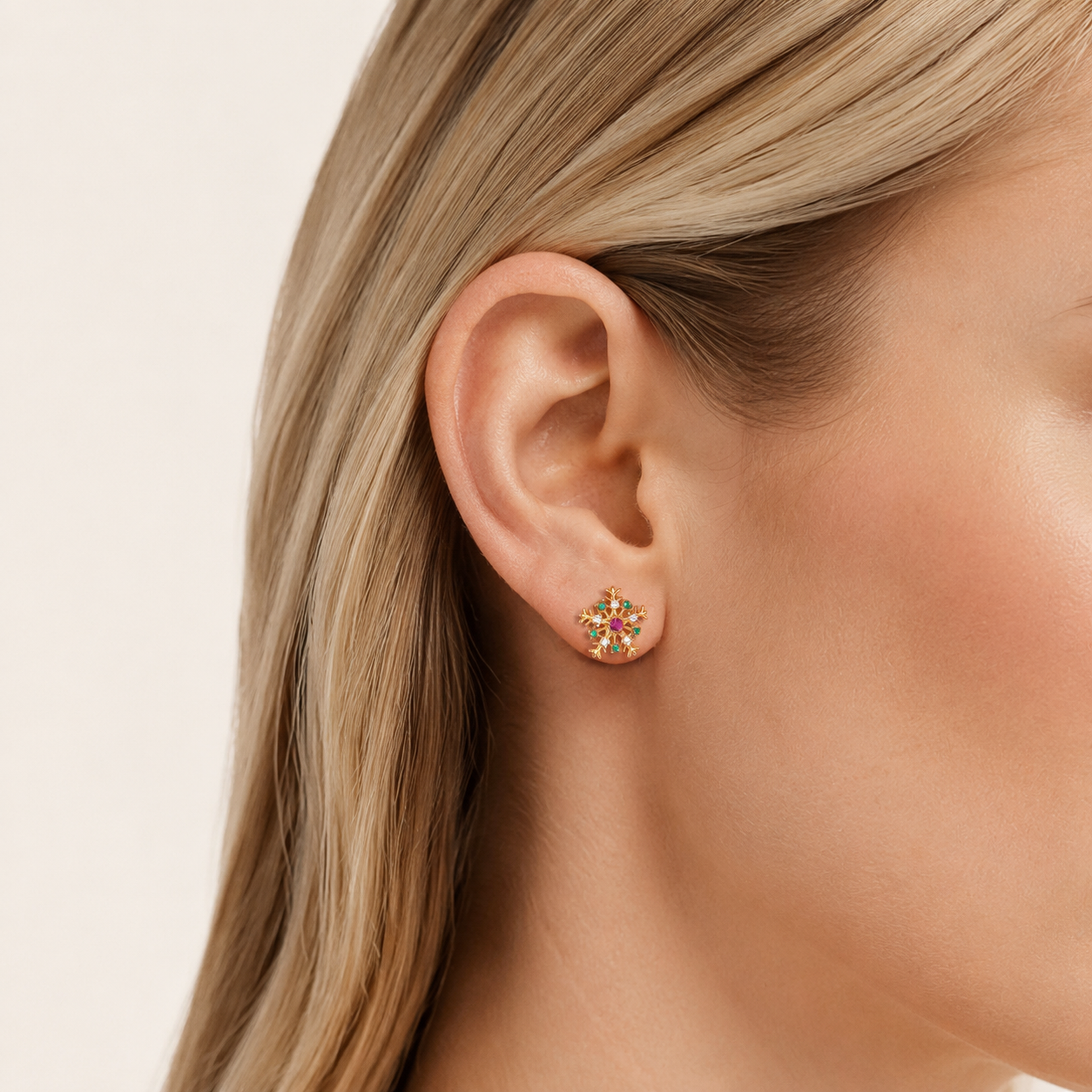 Sterling Silver Christmas Snowflake Stud Earrings worn on the ear
