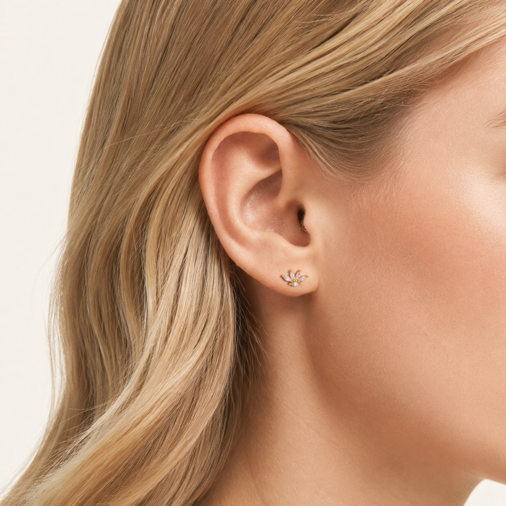 Sterling Silver Zirconia Crown Stud Earrings worn on the ear