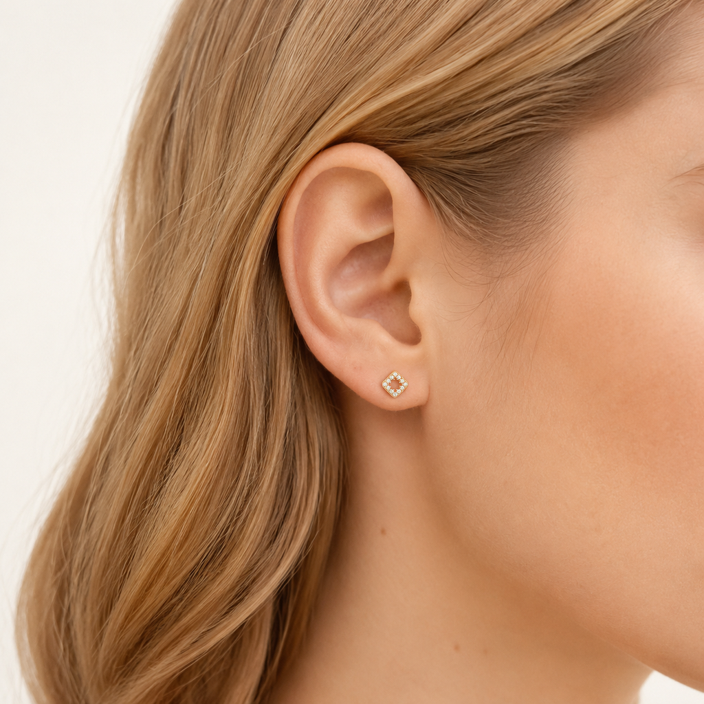 Sterling Silver Openwork Diamond Zirconia Flat Back Earrings worn on the ear
