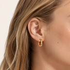 Sterling Silver Hollow Tube Stud Earrings worn on the ear