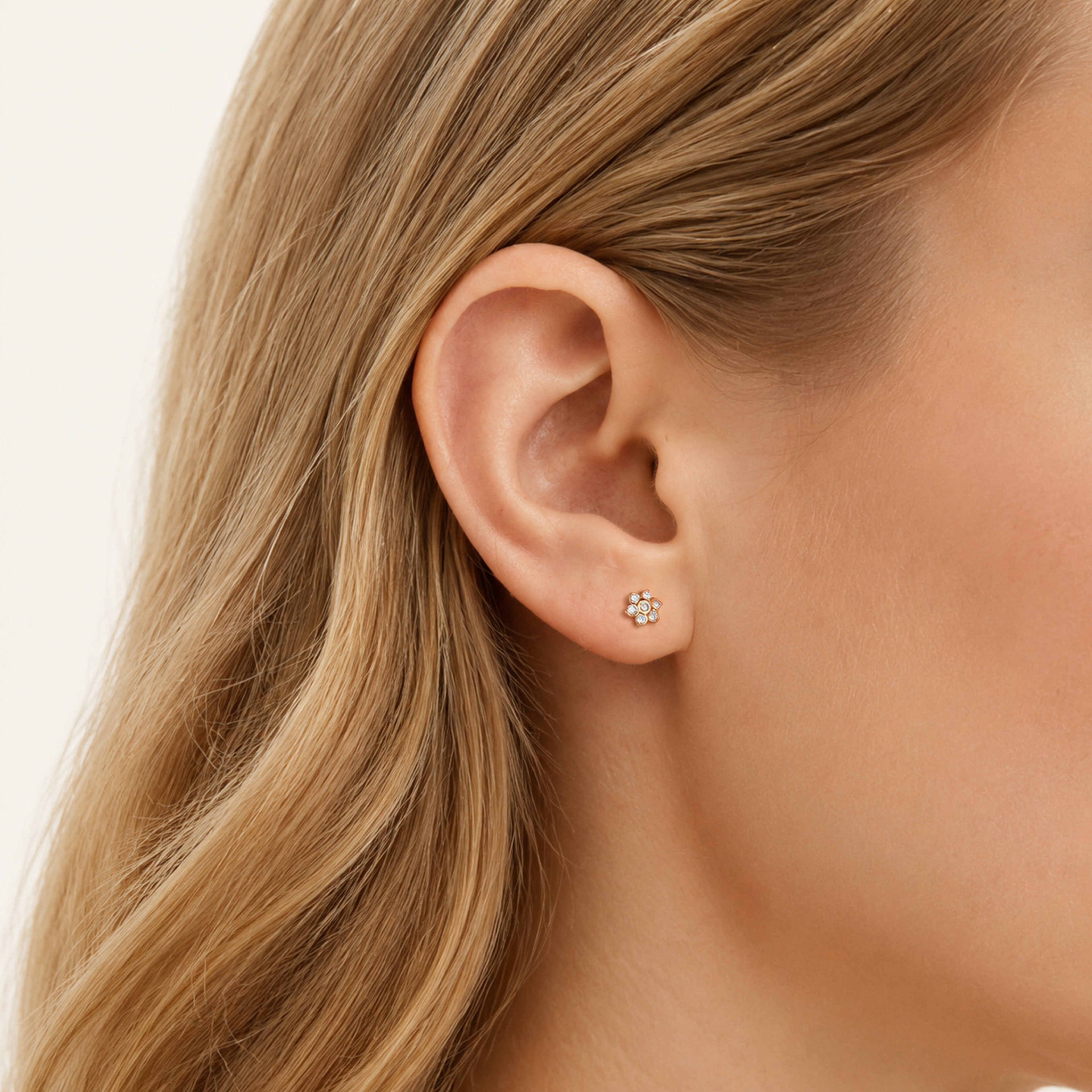 Sterling Silver Zirconia Spiral Cartilage Flat Back Earrings worn on the ear