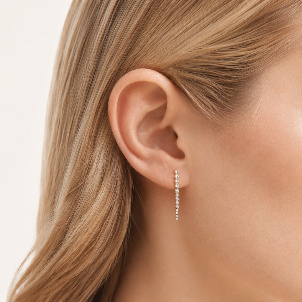 Sterling Silver Zirconia Bar Stud Earrings worn on the ear