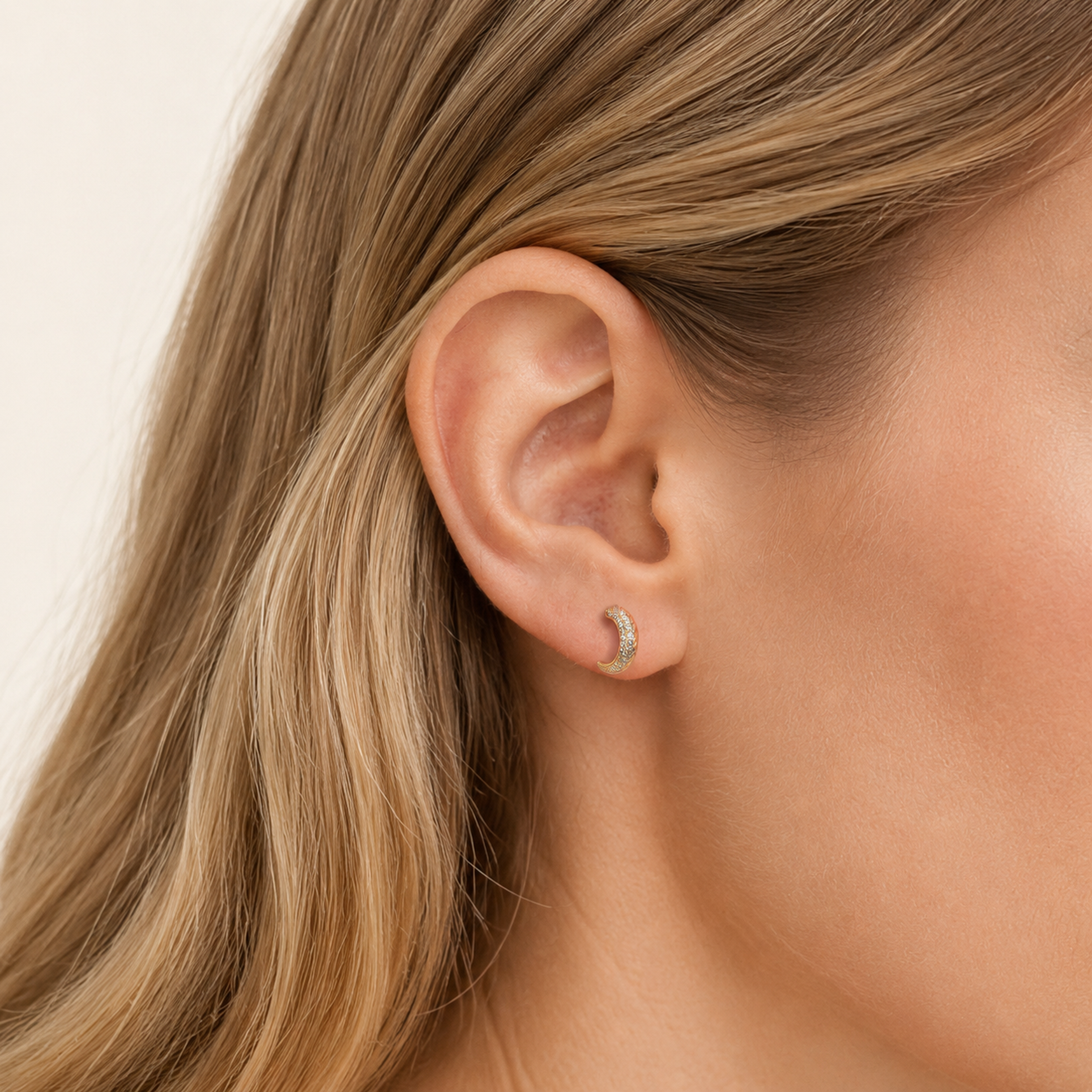 Sterling Silver French Minimalist Zirconia Stud Earrings worn on the ear