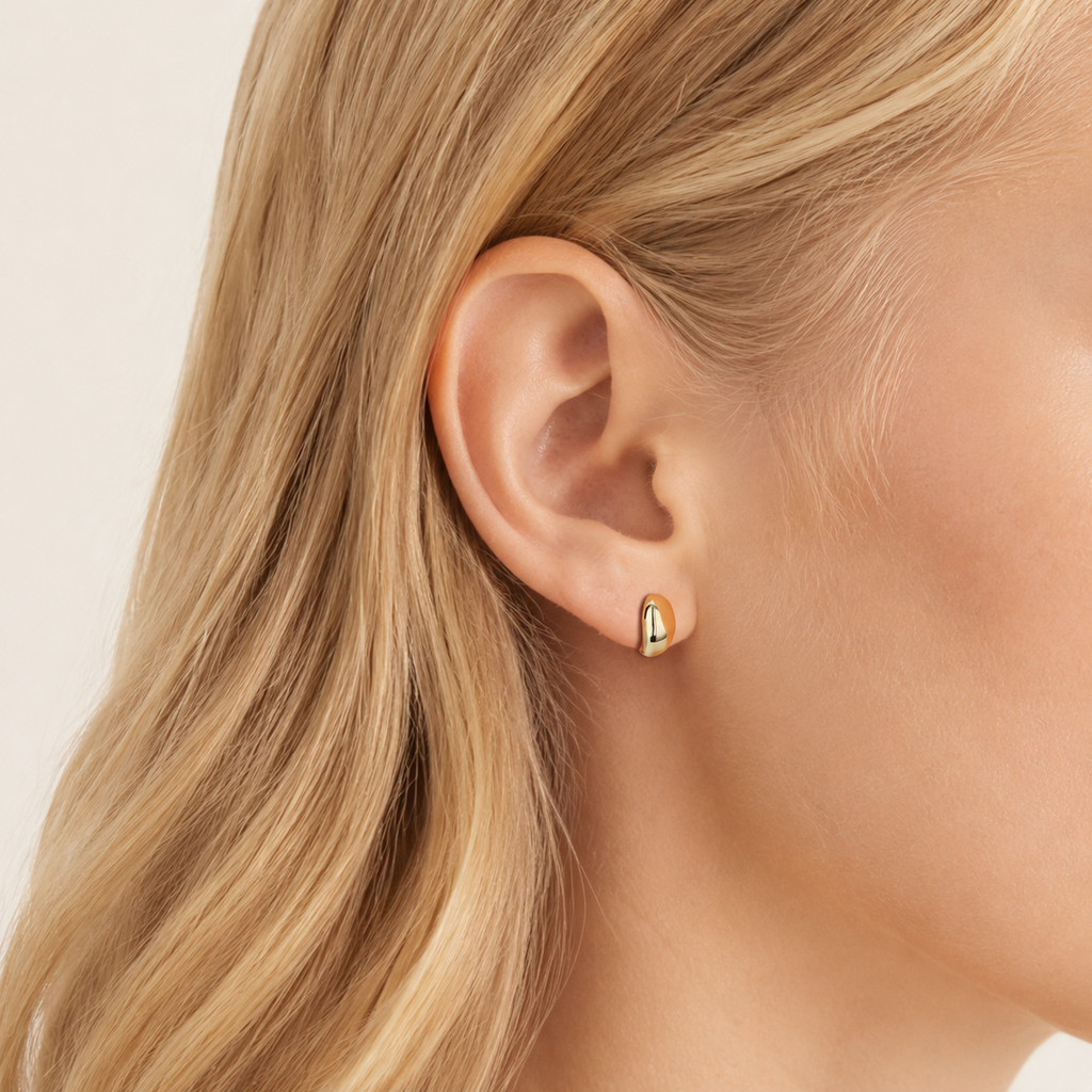Sterling Silver Crescent Moon Ball Stud Earrings worn on the ear