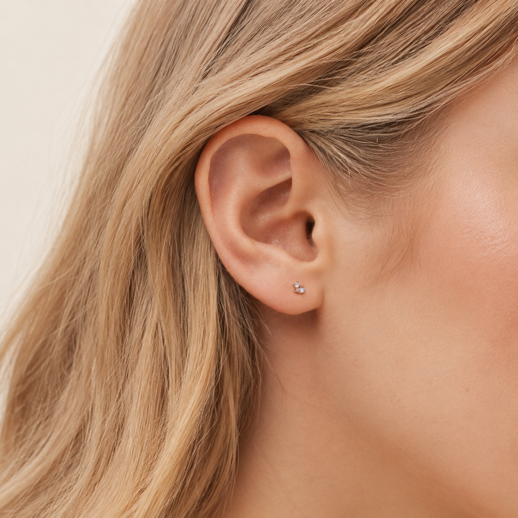 Sterling Silver Zirconia Teardrop Flat Back Earrings worn on the ear