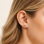 Sterling Silver Opal Feather Stud Earrings worn on the ear
