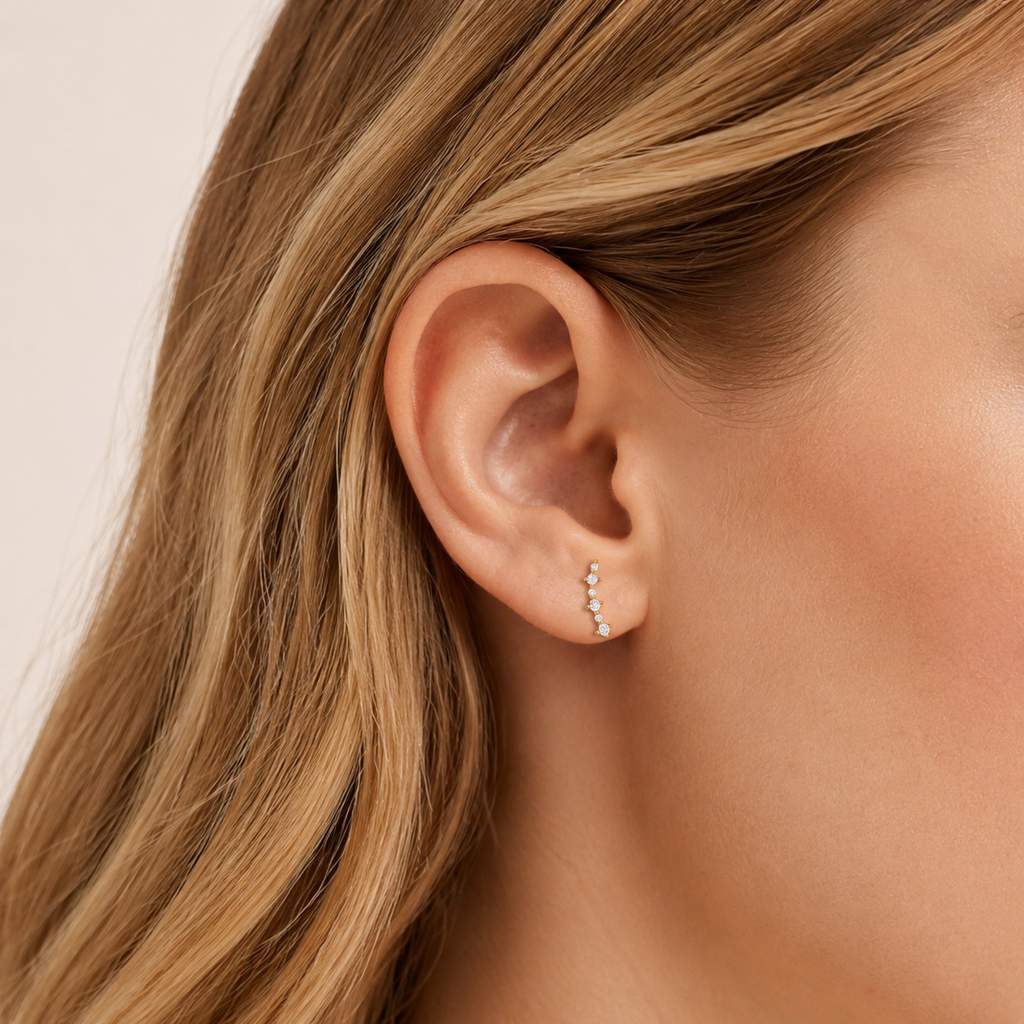 Sterling Silver Shooting Star Zirconia Stud Earrings worn on the ear
