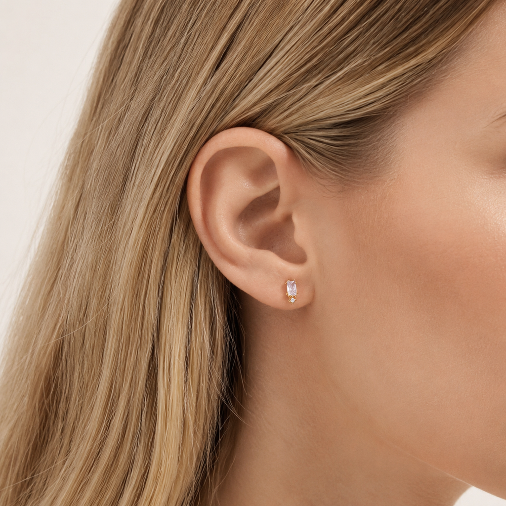 Sterling Silver Threaded Zirconia Cartilage Flat Back Earrings worn on the ear