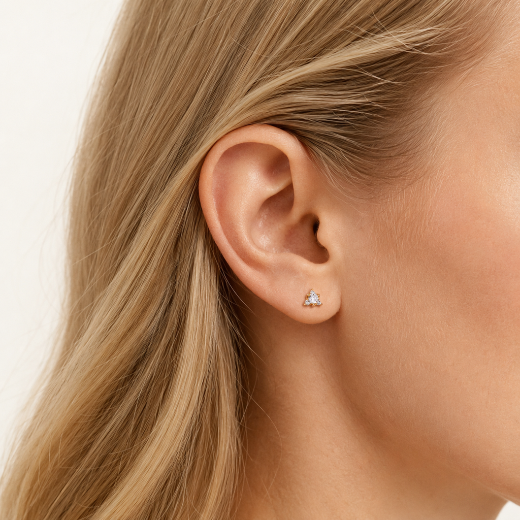 Sterling Silver Triangle Zirconia Flat Back Earrings worn on the ear
