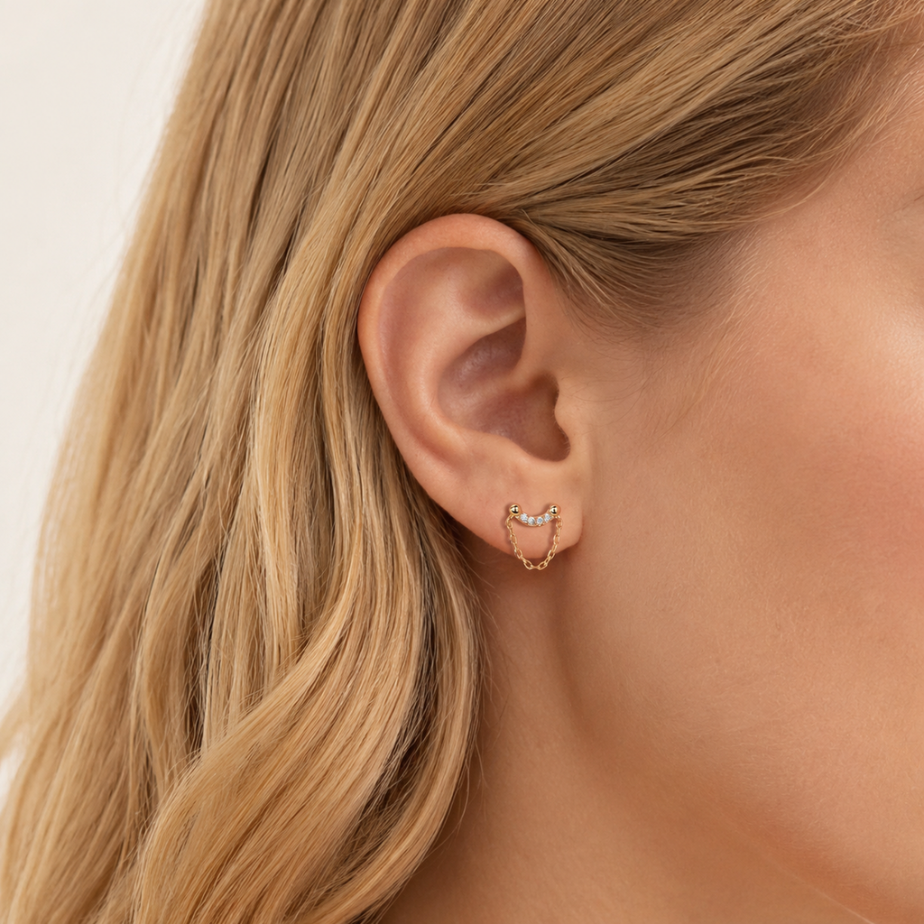 Sterling Silver Twisted Bead Zirconia Drop Flat Back Earrings worn on the ear