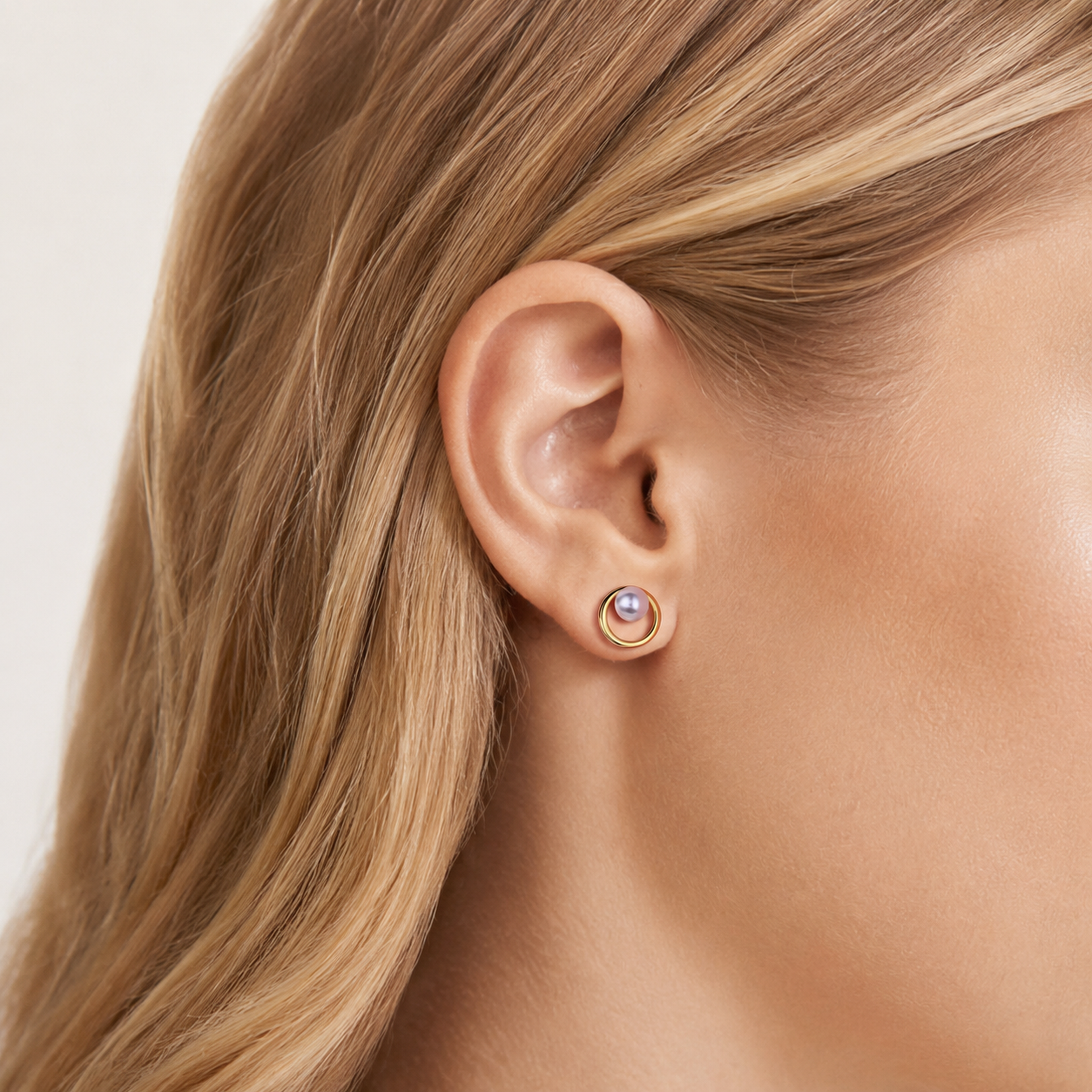 Sterling Silver French Pearl Stud Earrings worn on the ear