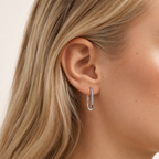 Sterling Silver Geometric U-Shape Zirconia Stud Earrings worn on the ear