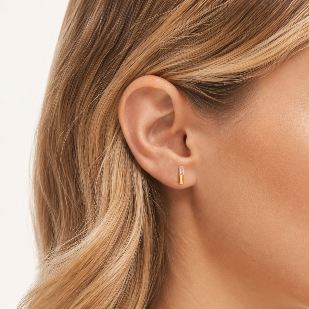 Sterling Silver Zirconia Square Stud Earrings worn on the ear
