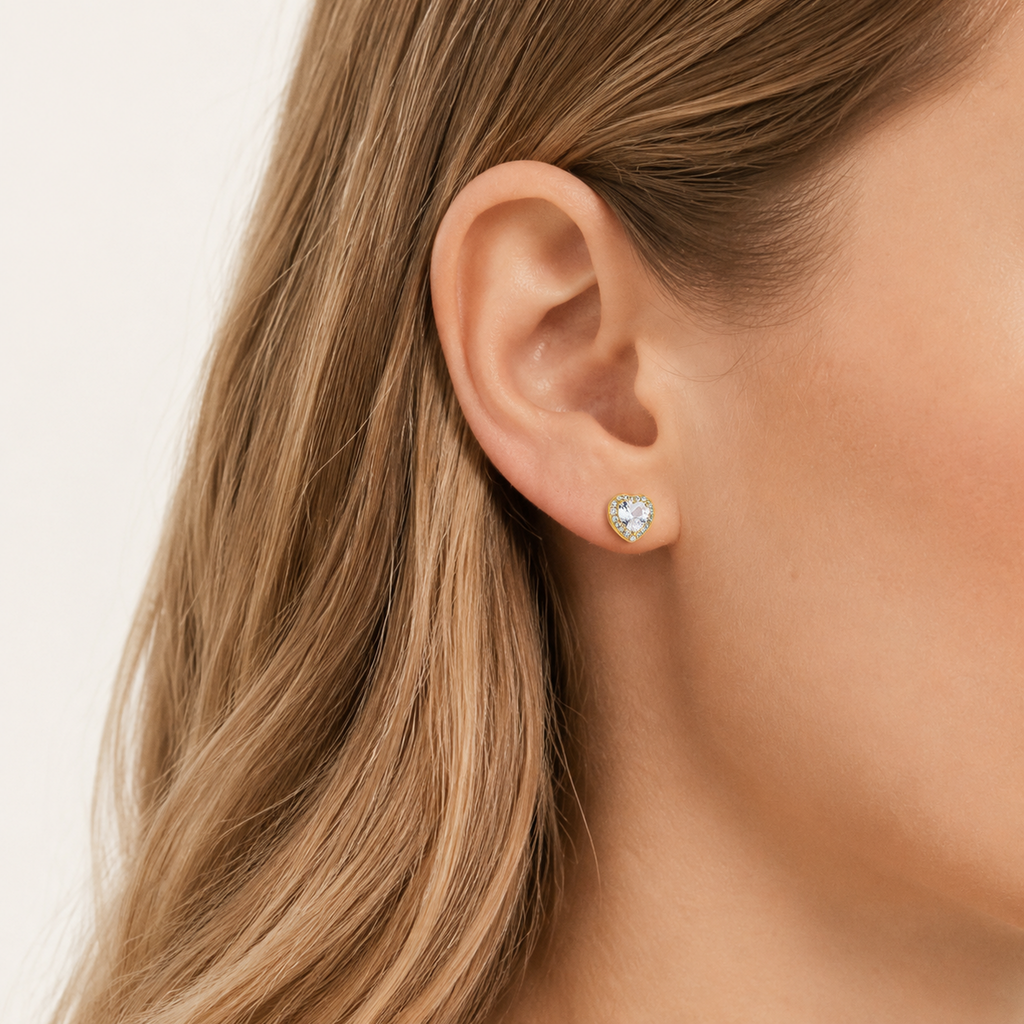 Sterling Silver Pave Heart Zirconia Stud Earrings worn on the ear