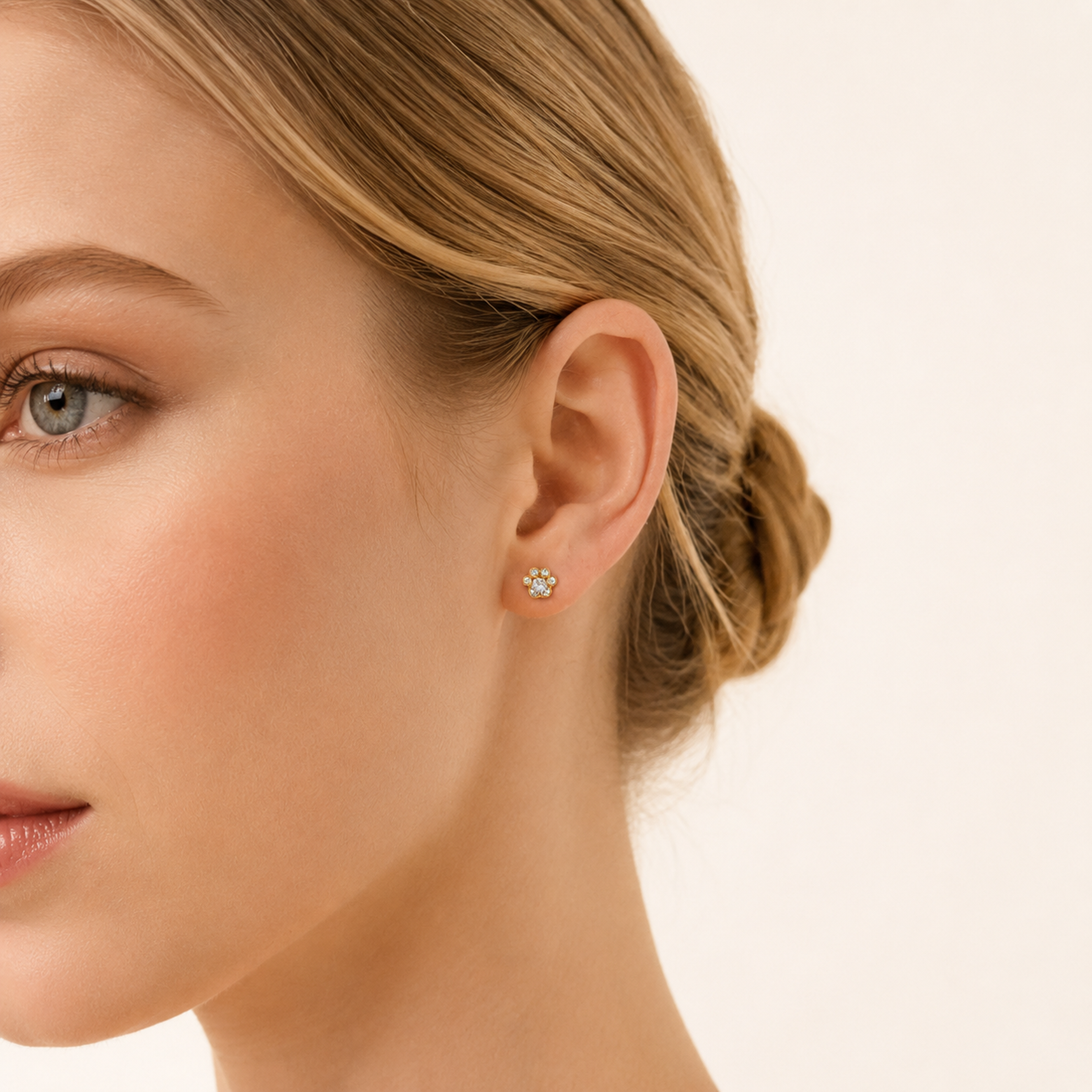 Sterling Silver Cat Paw Zirconia Flower Stud Earrings worn on the ear
